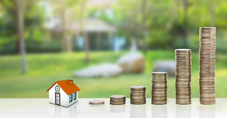 Small house and gold stack coins