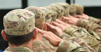 Soldiers giving salute