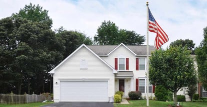 Suburban Residential Neighborhood with American Flag