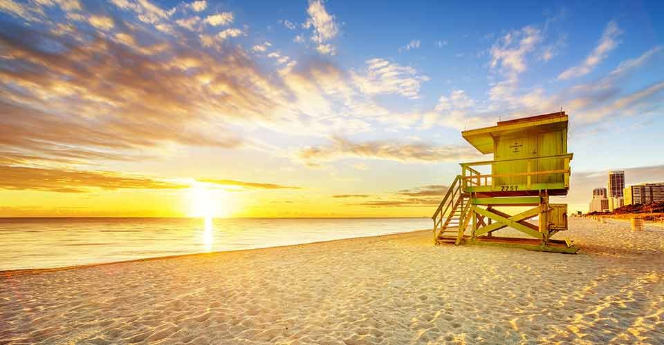 Sunrise and coastline with colorful blue sky in Miami South Beach