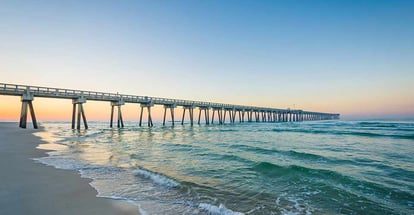 The MB Miller County Pier and Gulf of Mexico at sunrise in Panama City Beach Florida