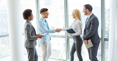 Trained real estate professionals shaking hands