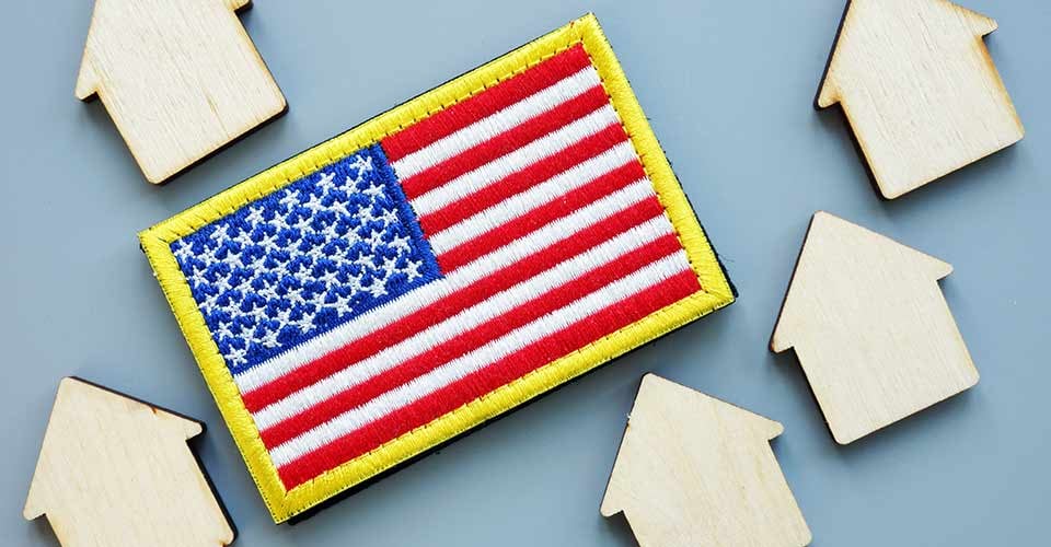 USA flag and models of house