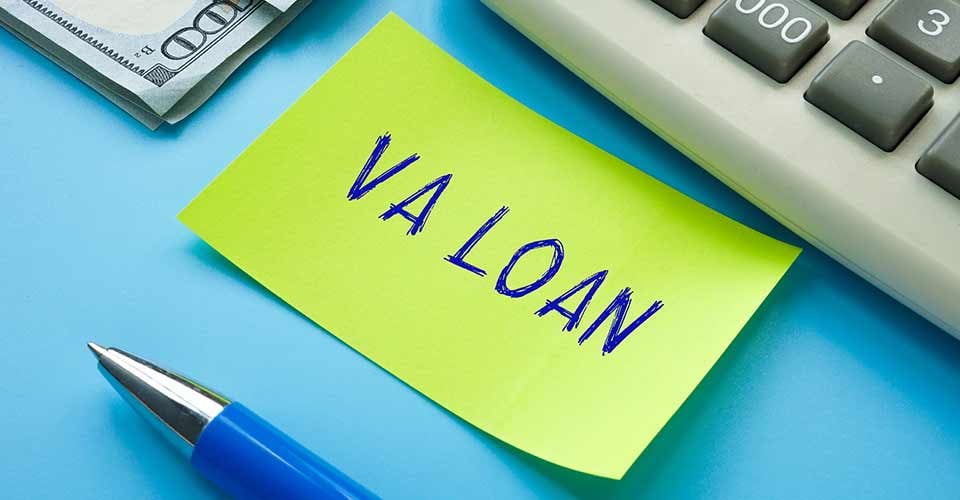 VA home loan with sign on the piece of paper
