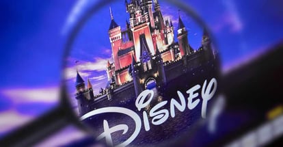 View of a Disney logo through a magnifying glass