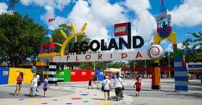 Visitors pass through the entrance to Legoland Florida in Winter Haven