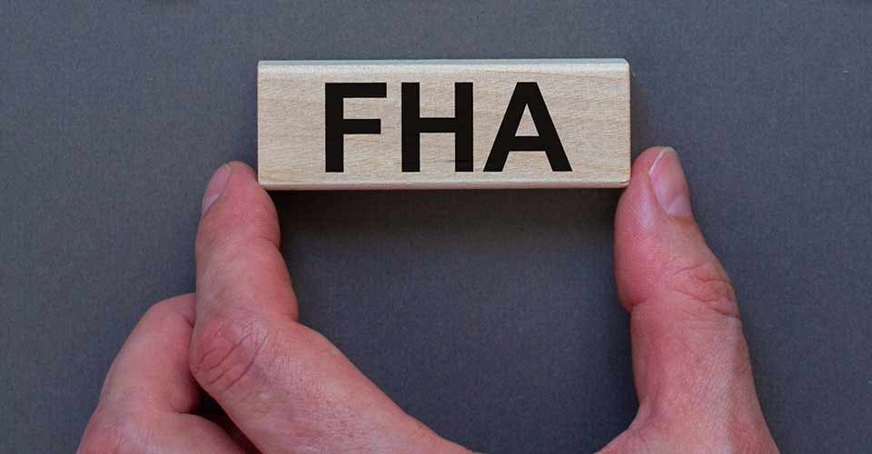 Wooden block with word FHA for Federal Housing Administration