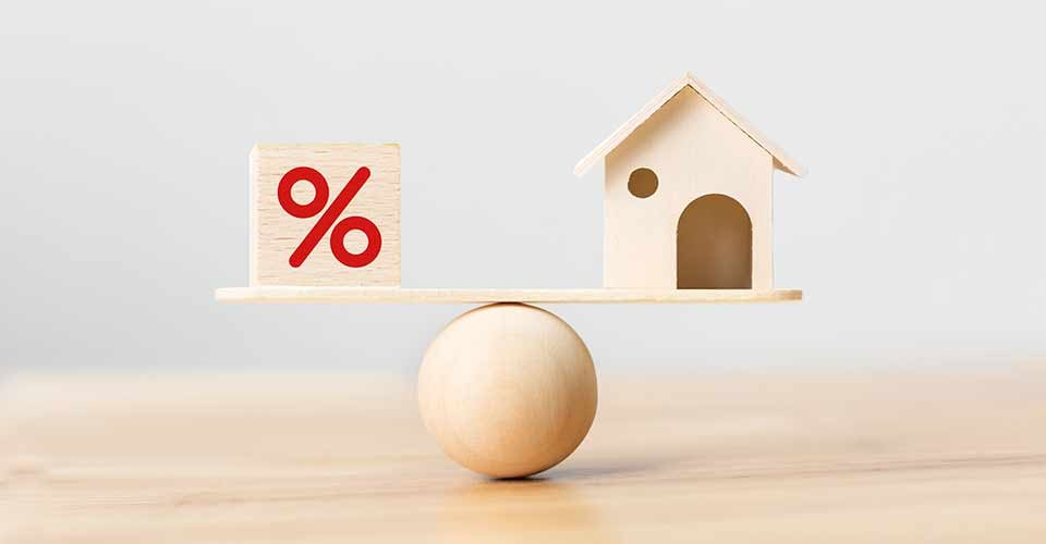 Wooden home and cube block shape with icon percent on wood scales