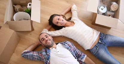 Young adults moving in new home