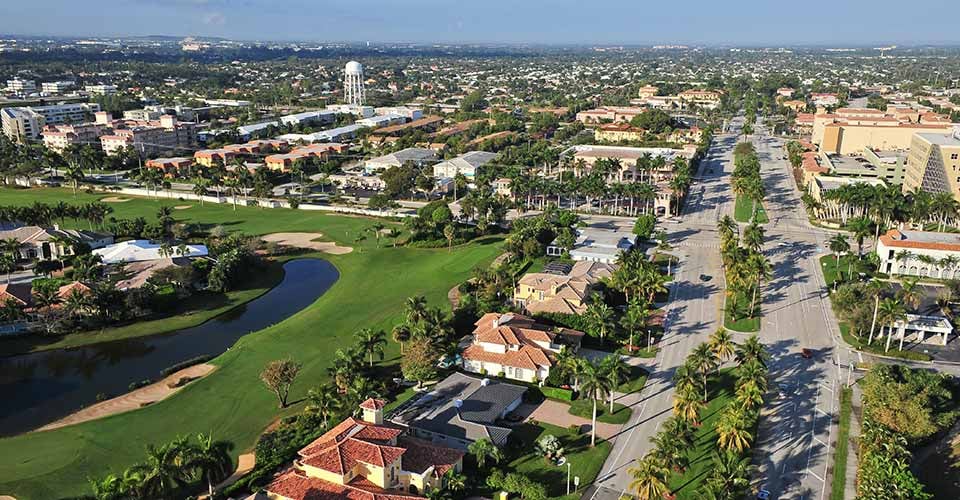 Aerial view of nice south Florida suburban community along highway