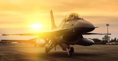 Falcon fighter jet military parked on runway in airforce base on sunset time