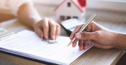 Real estate agent property giving house keys to house buyer and explain about agreement