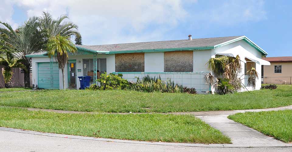 Suburban single family white ranch home